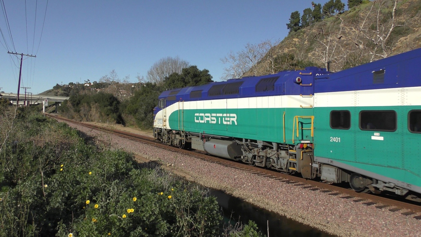 SDNX 2103 with train at CP Elvira in Rose Canyon 2016 SDNX 2103 with train near CP Elvira in Rose Canyon in 2016. Photo by Stephen Hager.