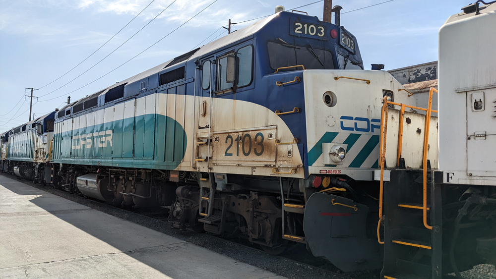 Coaster 2103 CRS SDNX 2103 awaits a trip back to San Diego at the Coast Rail Services facility in Anaheim, CA